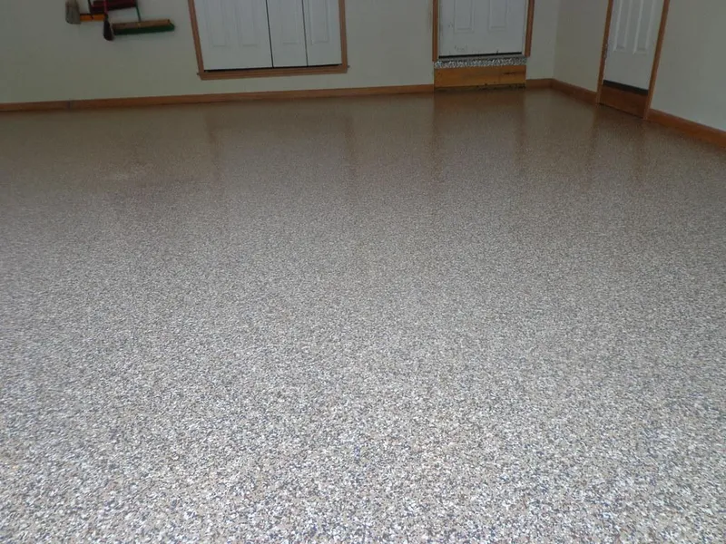 Gray flake epoxy floor in a two-car garage