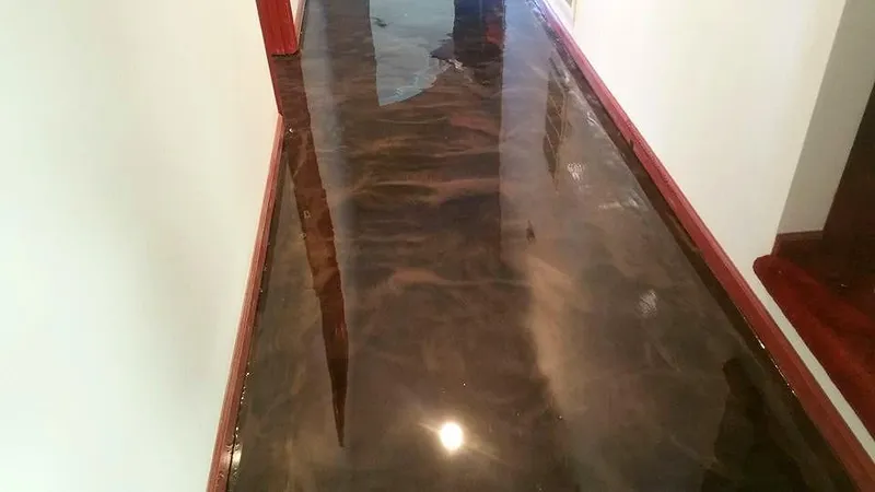 Brown metallic epoxy floor in a narrow hallway